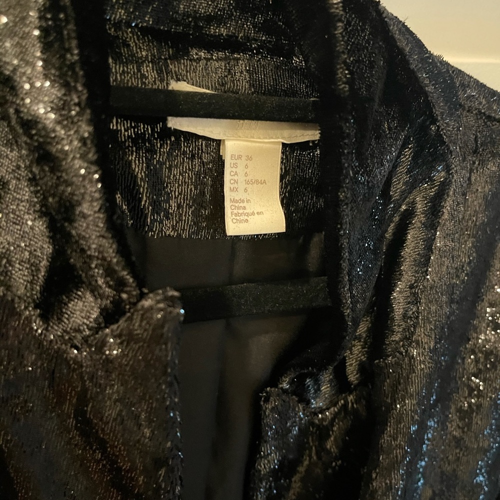 Shiny black blazer